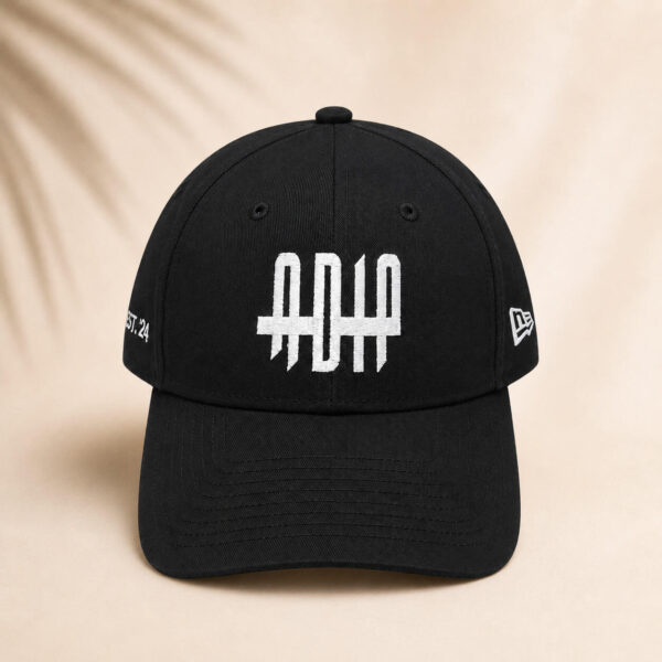 Unisex black luxury cotton cap by ADIP with embroidered design and spiritual wearable art inspiration