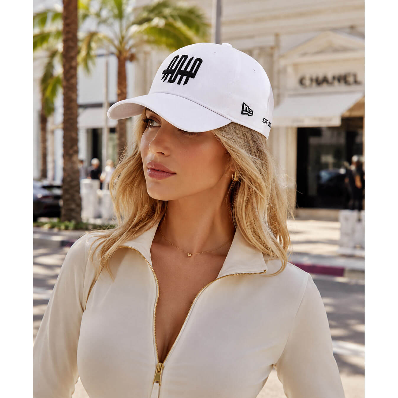 white embroidered cotton cap